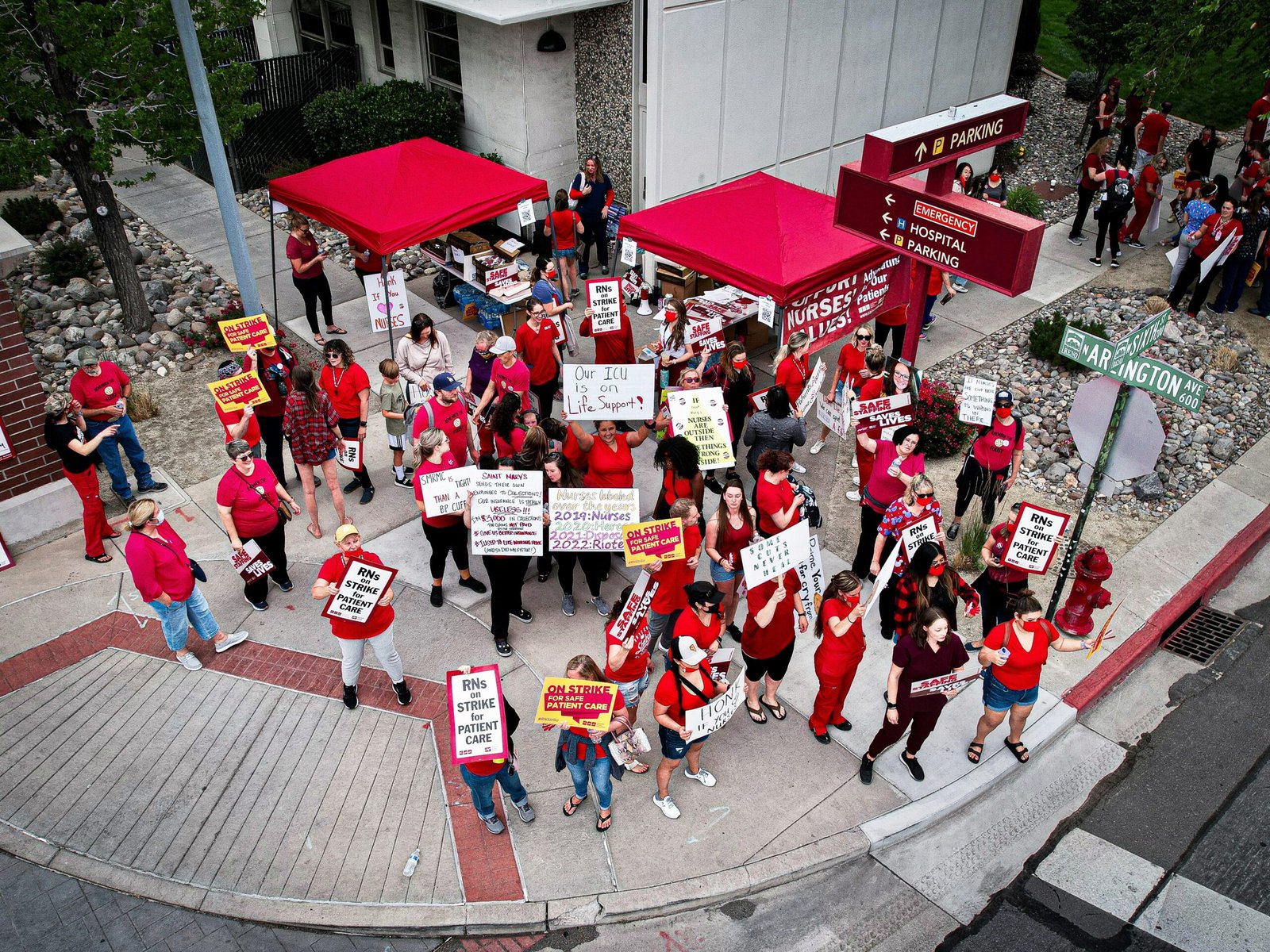 a group of people marching in the street